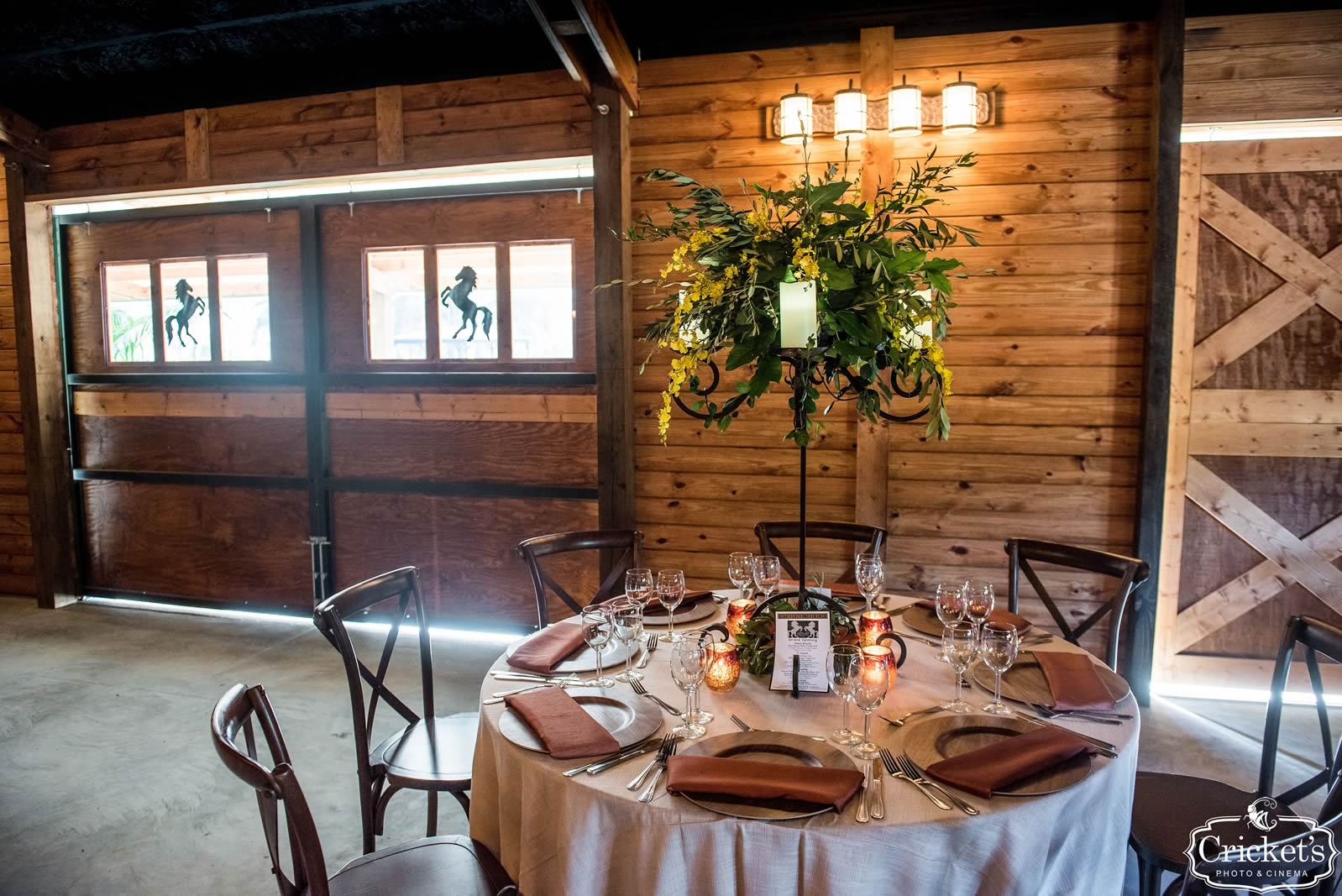 A beautiful floral arrangement on top of a decorated table