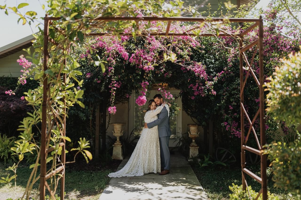 A-Gorgeous-Floral-Arch-with-Newlyweds-at-BLB-Hacienda